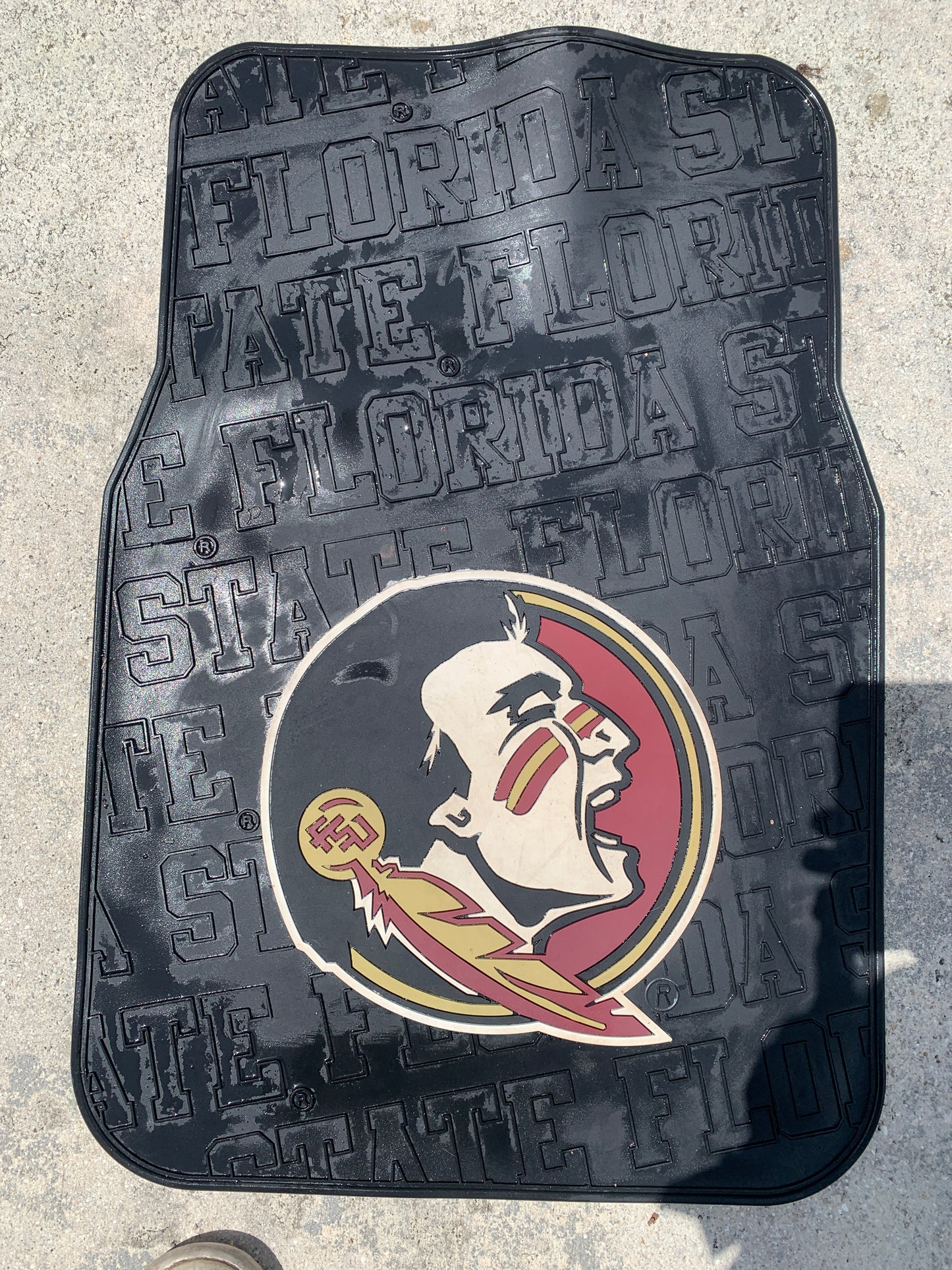Floor mat with Florida State University logo on it, showing school pride with a clean and detailed look.