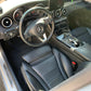 Mercedes-Benz interior after a deep clean, with the steering wheel and center console looking brand new and freshly coated.