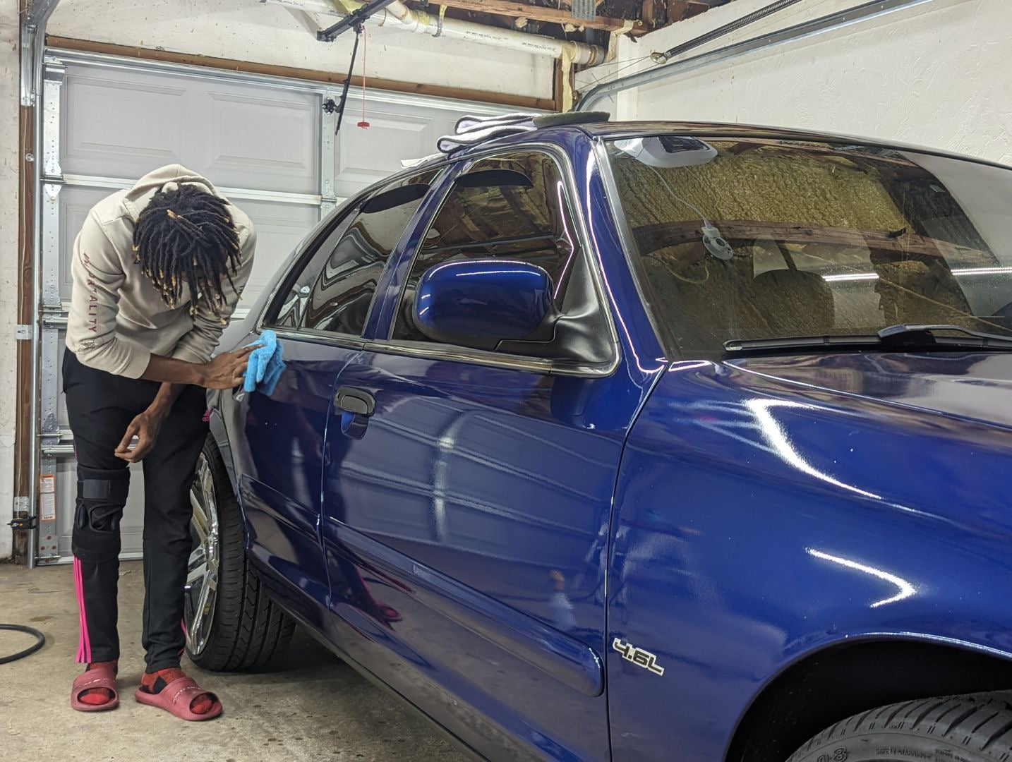 Certified Tech installing a graphene ceramic coating onto this Ford 