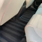 Straight line art created in the second row of the vehicle’s carpet after a deep shampooing and professional detailing.
