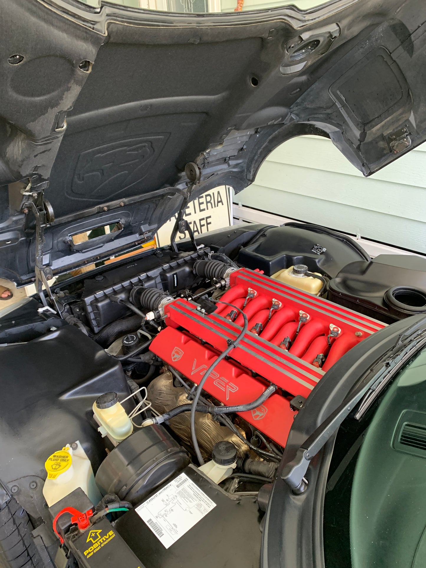 Engine bay detailing in progress: Restoring your car's heart.