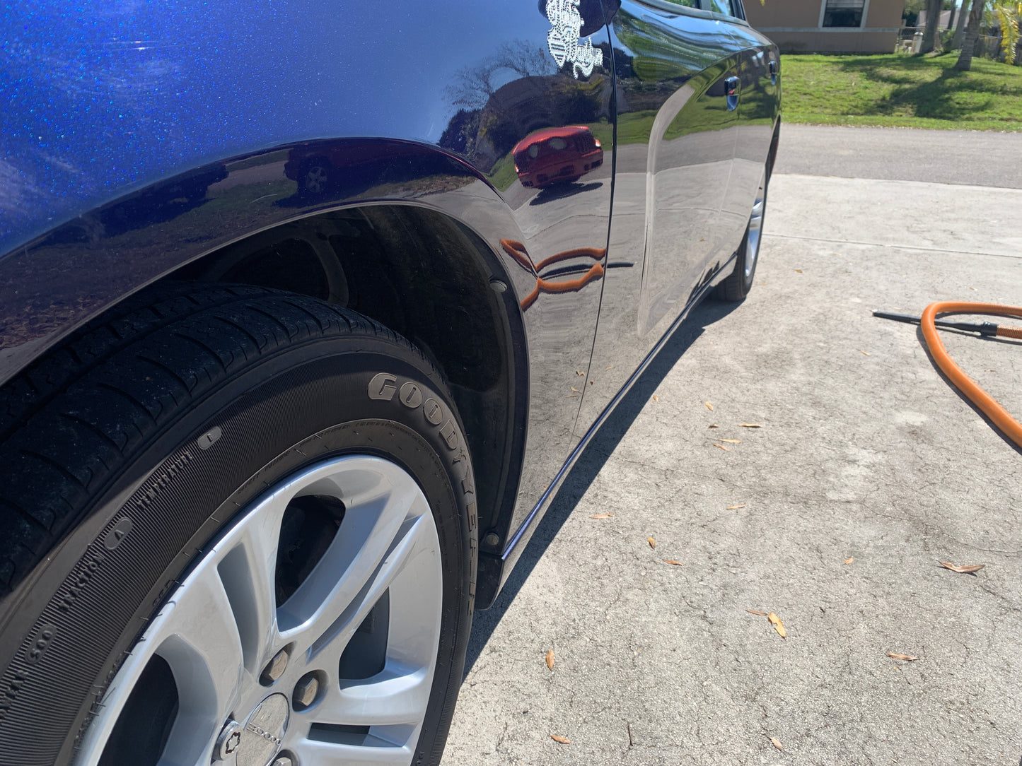 Detailing the car's exterior: Enhancing both aesthetics and protection.